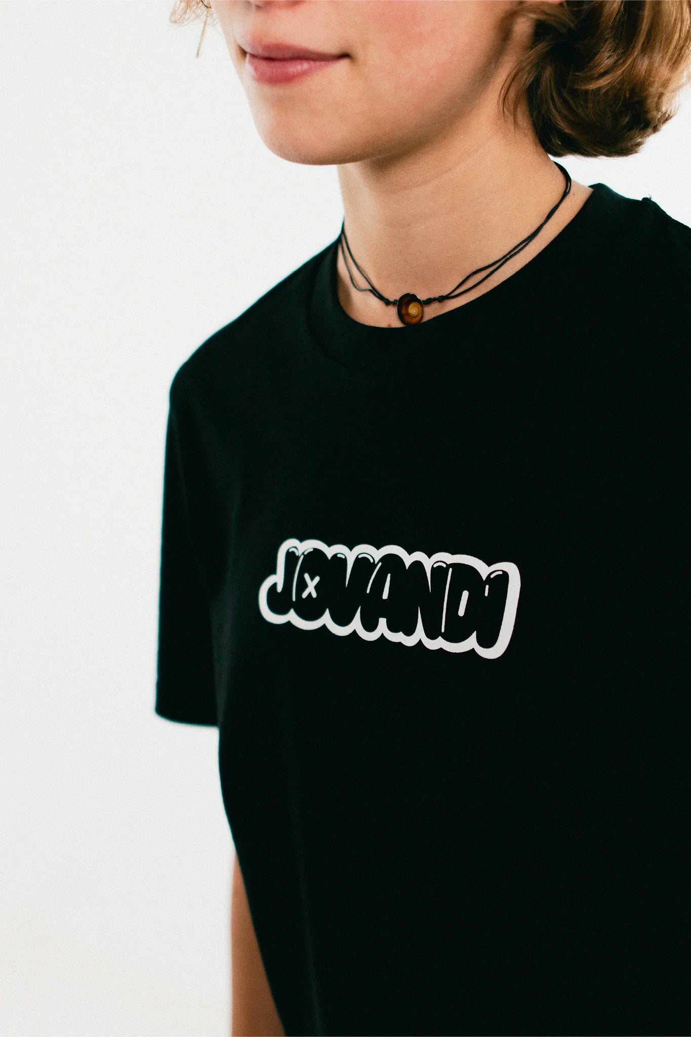 Woman wearing the black Jovandi bubble T-Shirt