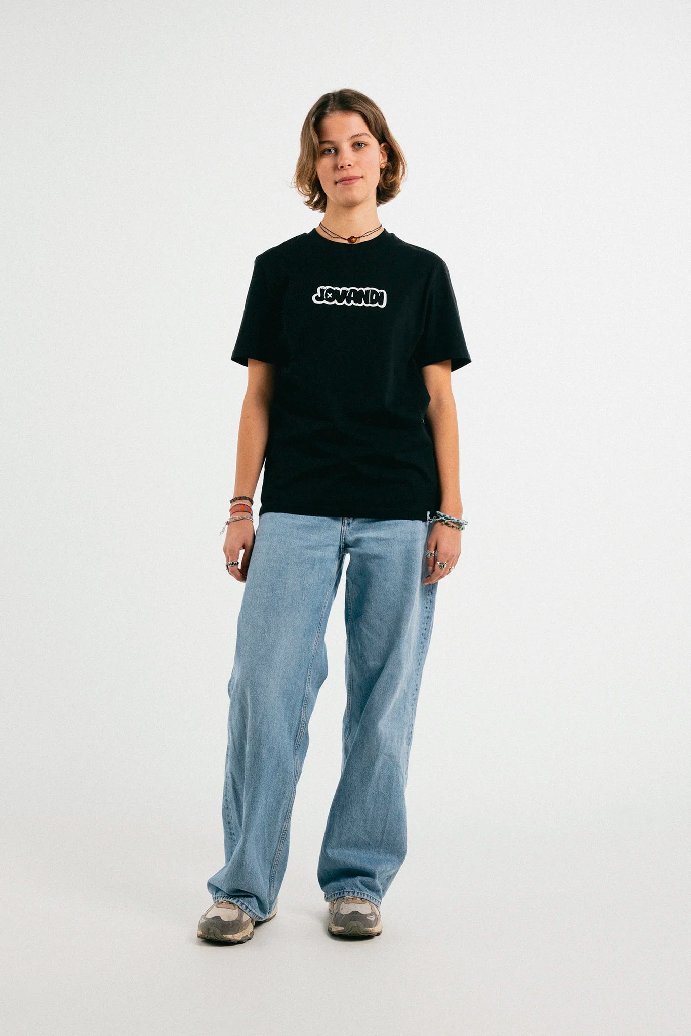 Woman wearing the black Jovandi bubble T-Shirt