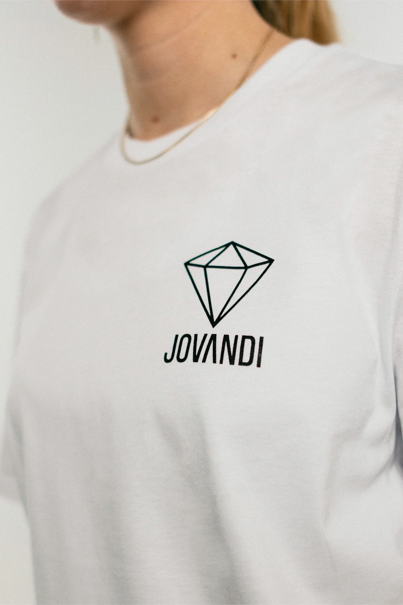 Closeup of the front graphic of the white Jovandi Diamonds T-Shirt