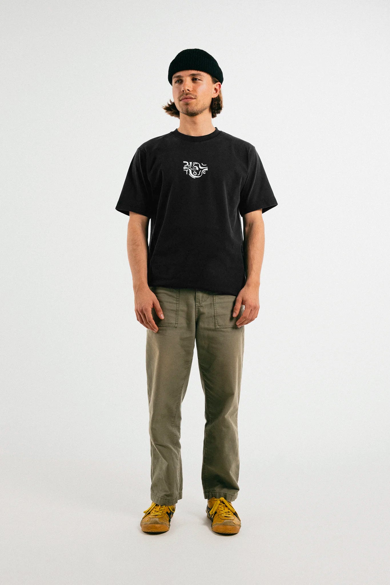 Man wearing the black Jovandi Drawn Lines T-Shirt