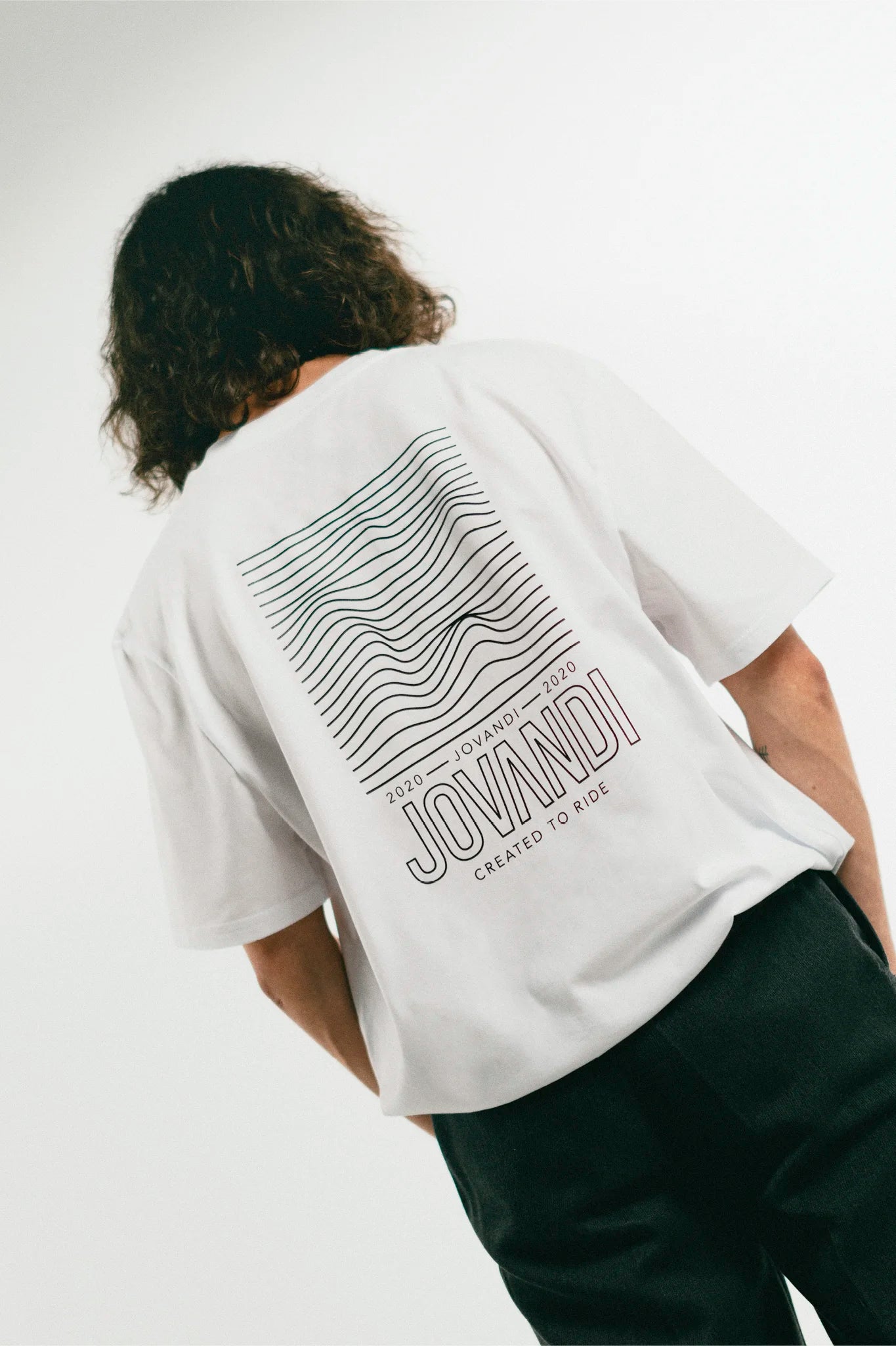 Man wearing the white Jovandi Lines T-Shirt