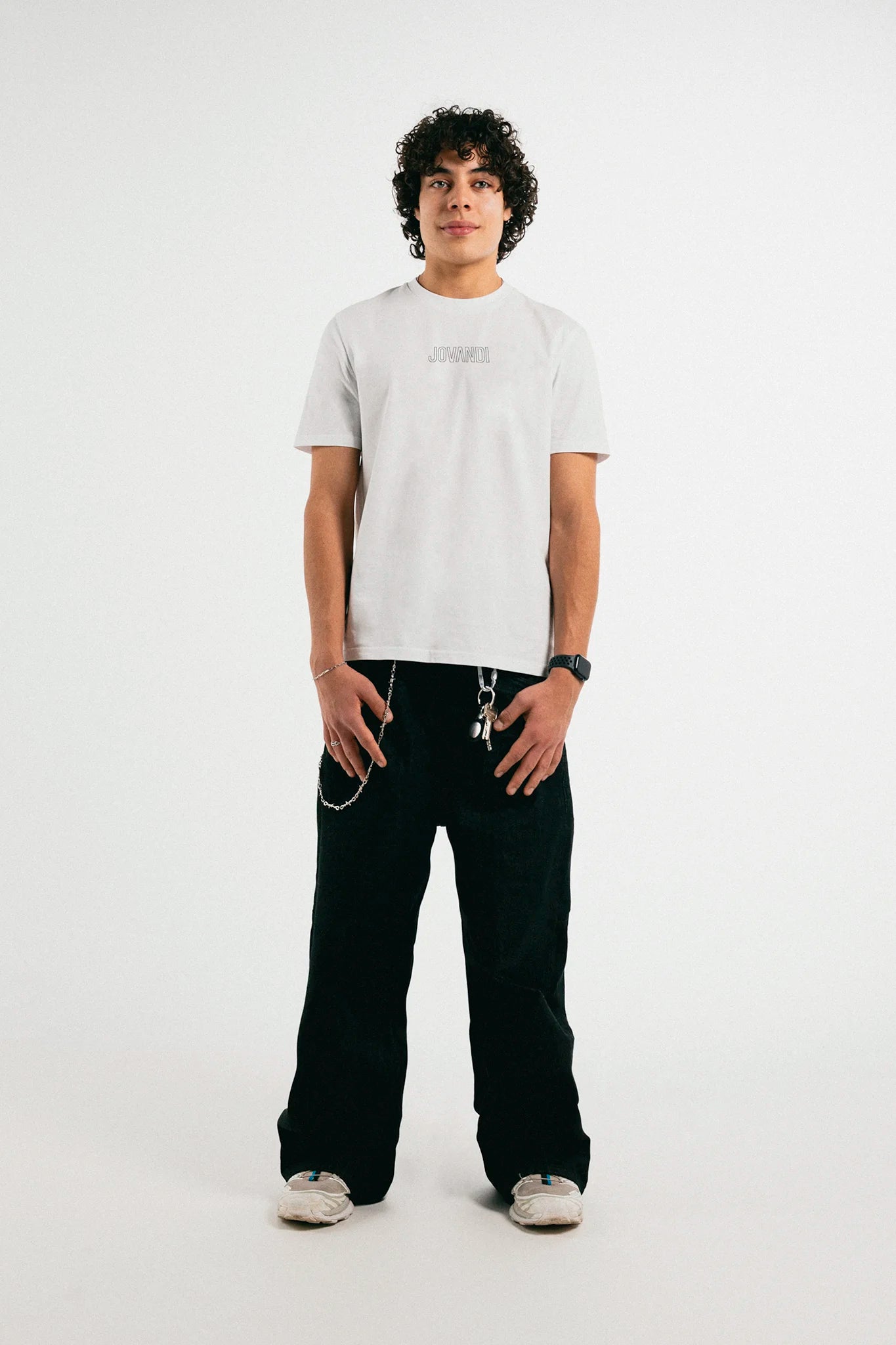 Man wearing the white Jovandi Lines T-Shirt