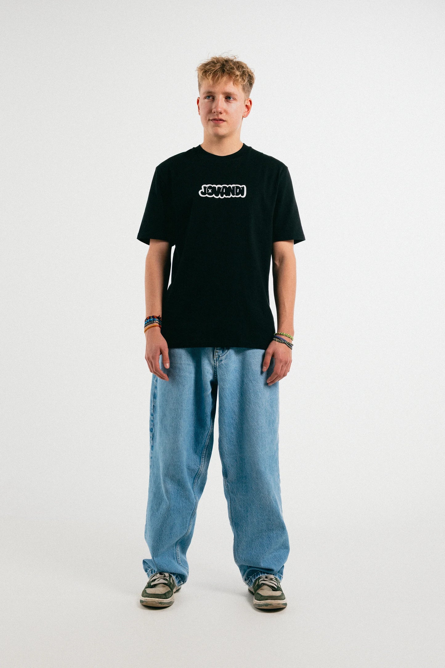 Man wearing the black Jovandi bubble T-Shirt
