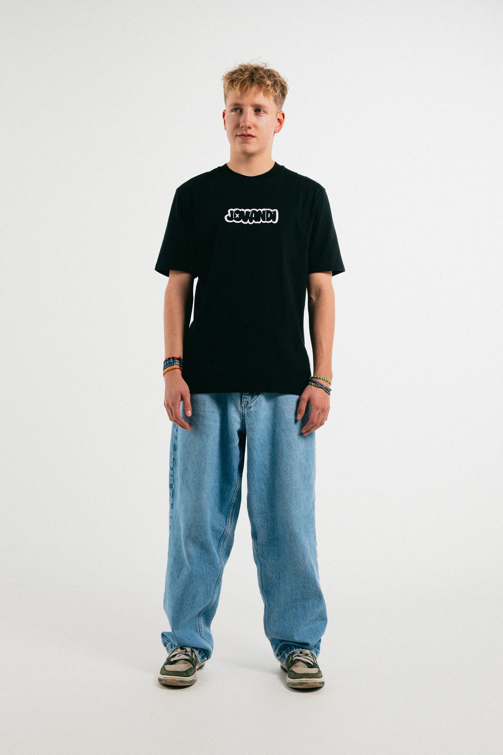 Man wearing the black Jovandi bubble T-Shirt