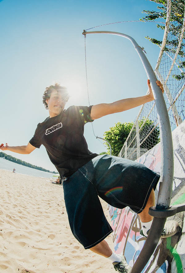 a dude hanging on the wall with the bouble tshirt