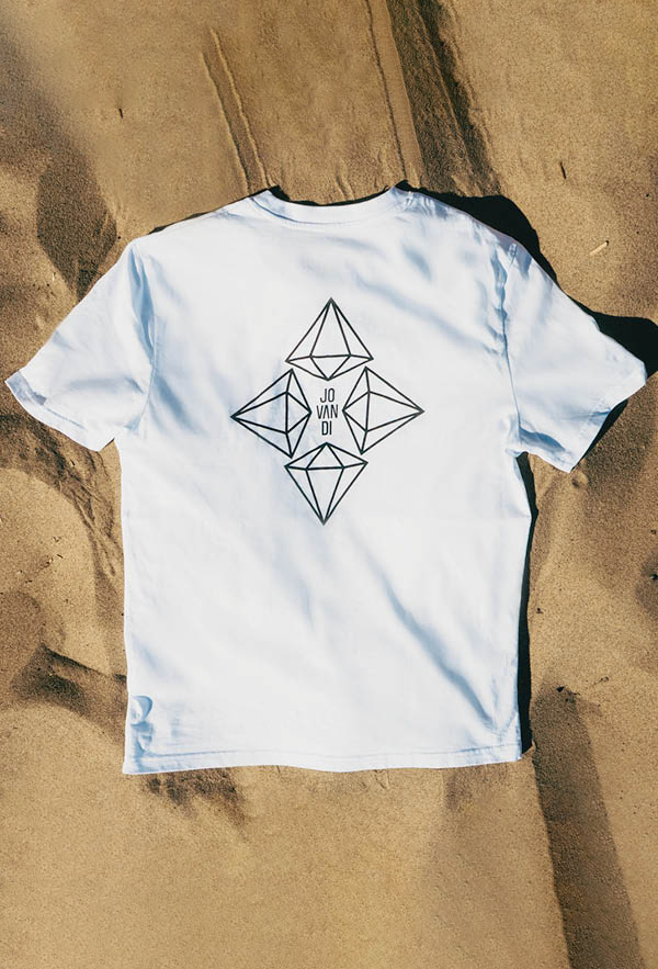 flatlay of the diamonds tshirt on the sand