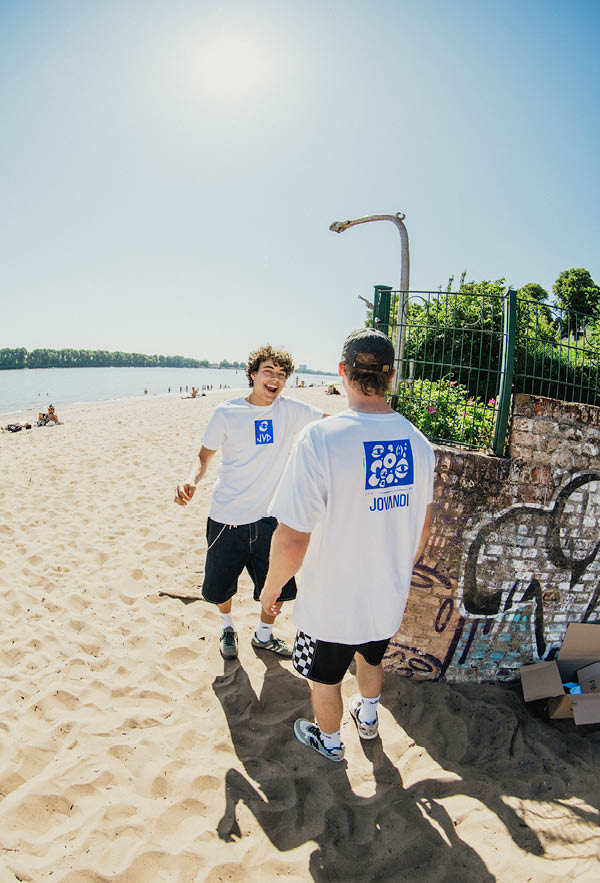 two dudes smiling with the cheyes 1 and 2 tshirt
